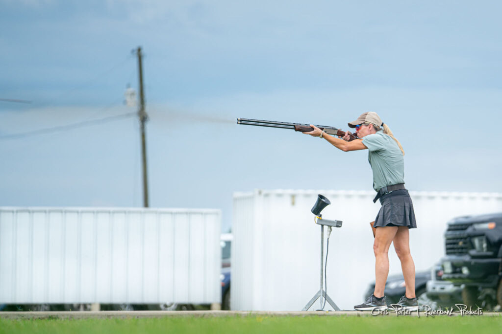 Woman Shooting Shotgun